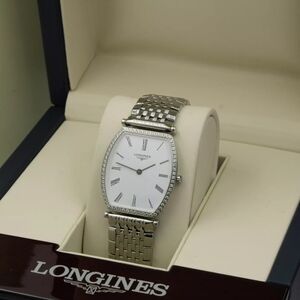 Longines diamond watches in like new condition fits 7-8 , also has extra links